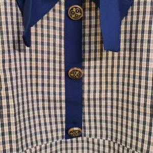 Flared beige and navy check dress with short sleeves and front button detail