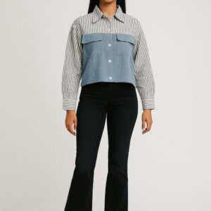 Woman in striped and denim-paneled shirt