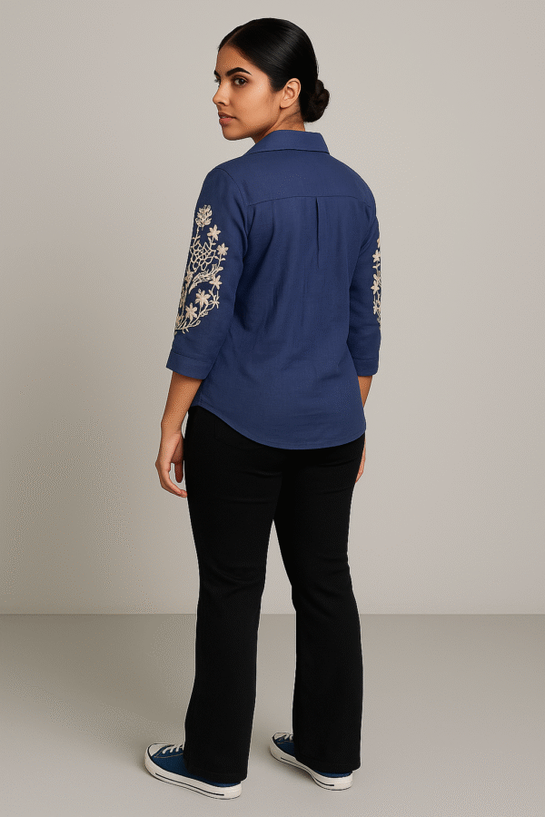 Elegant 3/4 sleeve navy blue shirt with front embroidery styled for casual wear