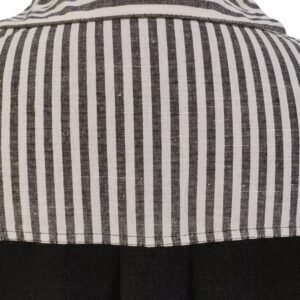 Striped and solid black combo shirt styled with black pants and sneakers for bold casual look