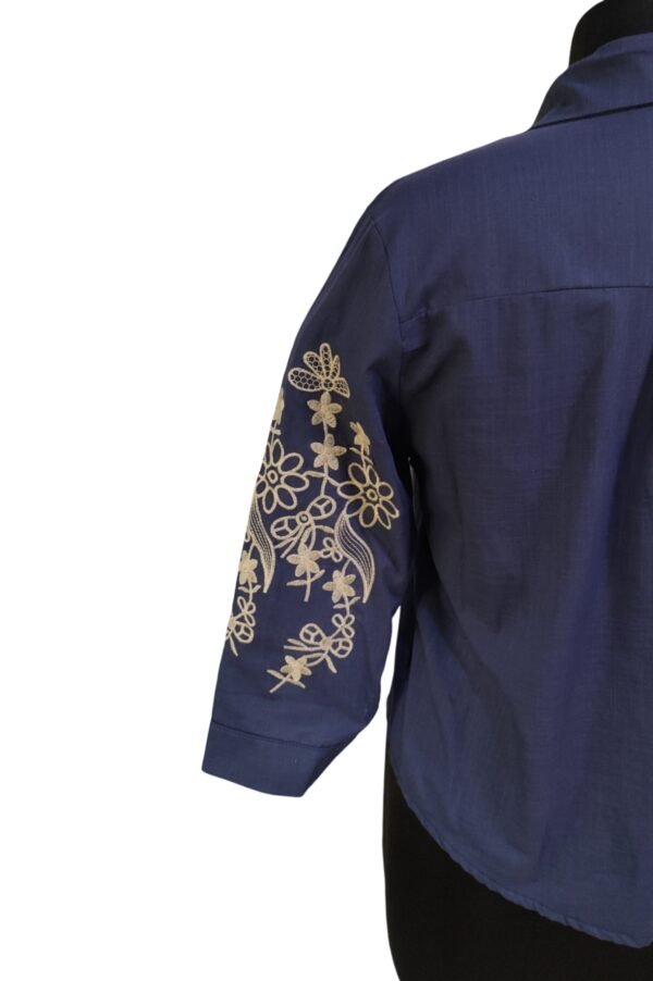 Elegant 3/4 sleeve navy blue shirt with front embroidery styled for casual wear