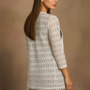 model wearing white crochet shrug with black outfit