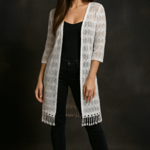 model wearing white crochet shrug with black outfit