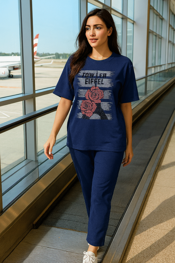 Woman in navy blue airport co-ord set