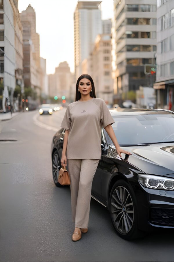 Elegant beige airport co-ord set with oversized top and trousers for women