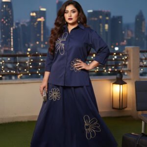 Two-piece navy co-ord outfit featuring shirt and A-line skirt with blooms