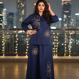 Two-piece navy co-ord outfit featuring shirt and A-line skirt with blooms