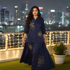 Two-piece navy co-ord outfit featuring shirt and A-line skirt with blooms