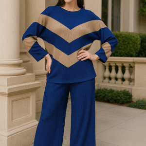 Woman wearing a blue and taupe chevron co-ord set with wide-leg pants